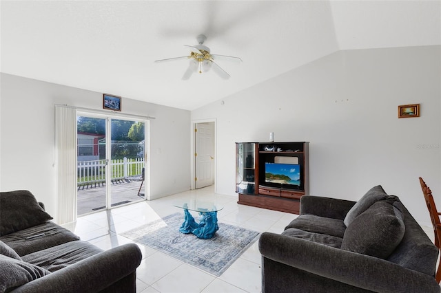 tiled living room featuring ceiling fan and lofted ceiling