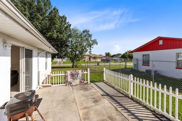 148 Merida Dr, Kissimmee, FL 34743 - view of patio featuring grilling area and fence