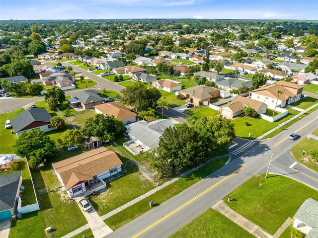 148 Merida Dr, Kissimmee, FL 34743 - drone / aerial view featuring a residential view