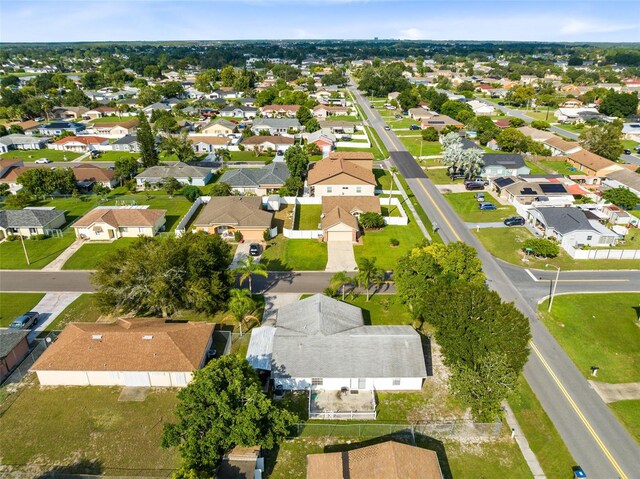 148 Merida Dr, Kissimmee, FL 34743 - drone / aerial view featuring a residential view