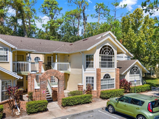 townhome / multi-family property featuring a balcony