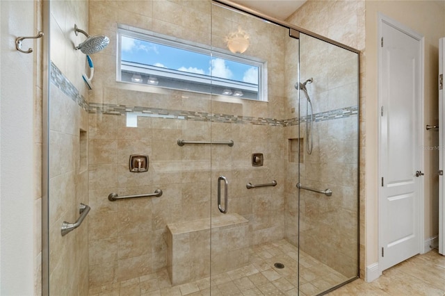 bathroom featuring an enclosed shower