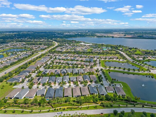 drone / aerial view featuring a water view