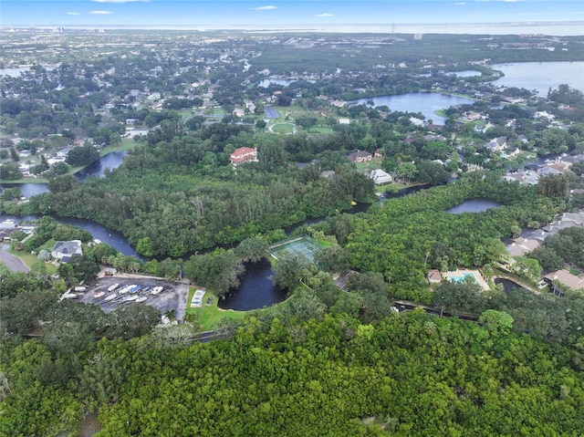 birds eye view of property with a water view