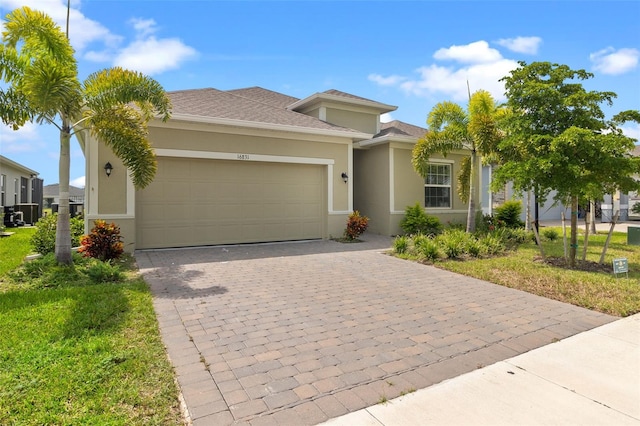 view of front of property with a garage