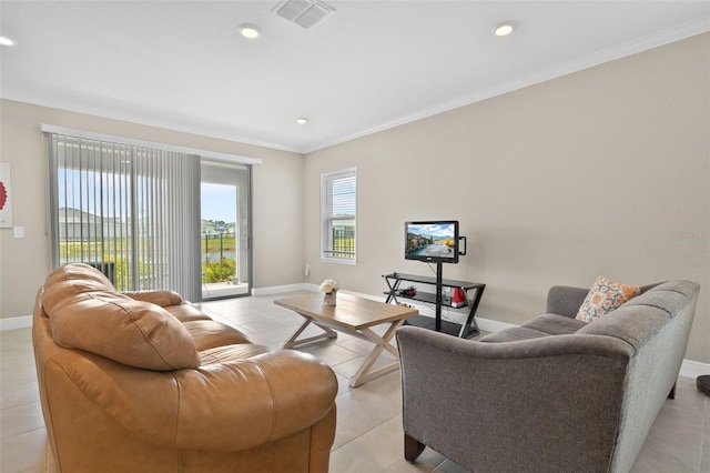 living room featuring crown molding and light tile patterned flooring