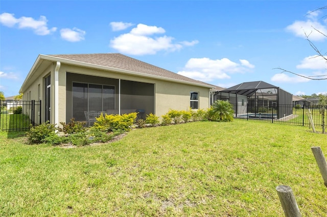 exterior space featuring a swimming pool and a lanai