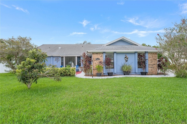 ranch-style house with a front yard