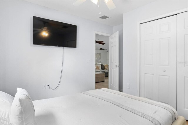 bedroom with a closet and ceiling fan