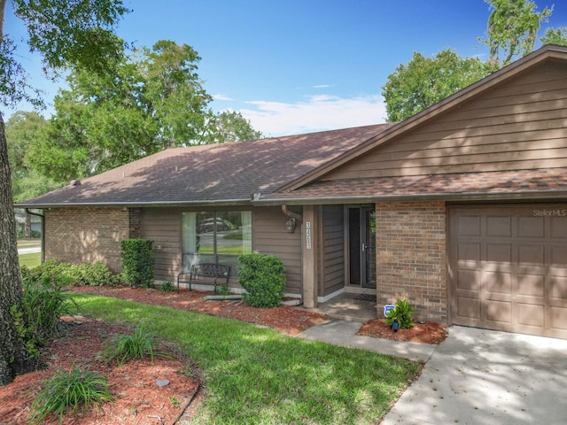 ranch-style home with a garage