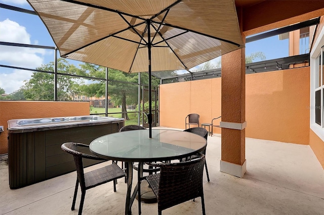 view of patio / terrace featuring a lanai