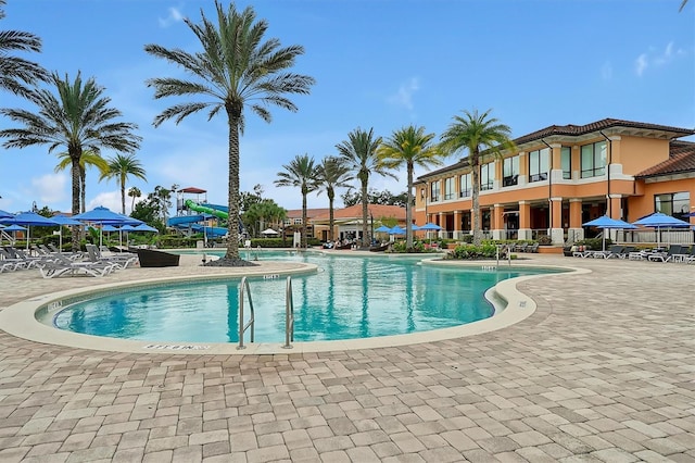 view of swimming pool featuring a patio