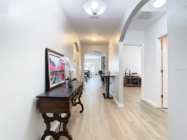 hall featuring light wood-type flooring