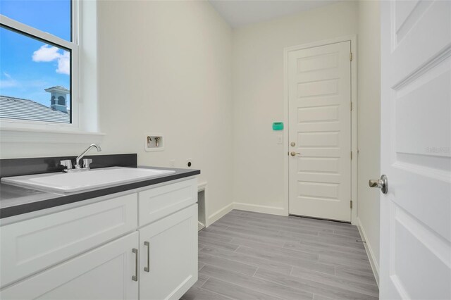 bathroom with wood-type flooring and vanity