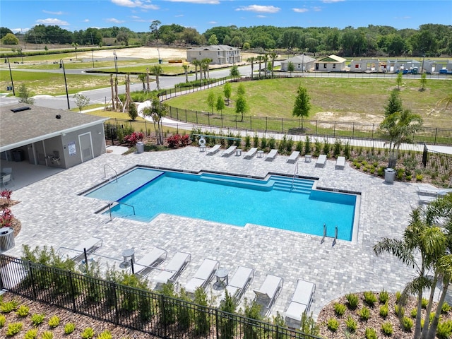 view of pool featuring a patio