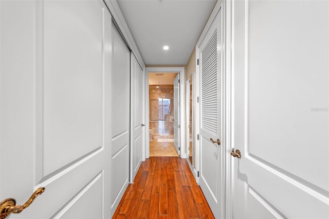 155 S Court Ave Unit 2710, Orlando, FL 32801 - hallway with recessed lighting and dark wood-style flooring