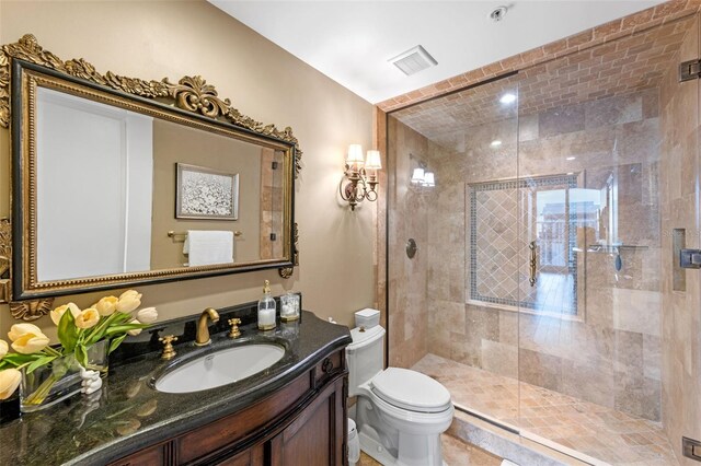 155 S Court Ave Unit 2710, Orlando, FL 32801 - full bath with toilet, vanity, and a stall shower