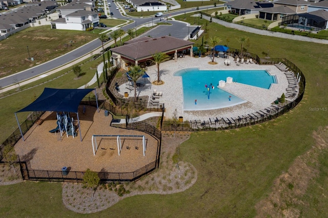 birds eye view of property with a residential view