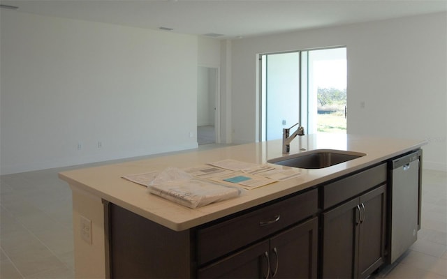 14569 Crestavista Dr, Clermont, FL 34714 - kitchen featuring a sink, stainless steel dishwasher, a center island with sink, light countertops, and open floor plan