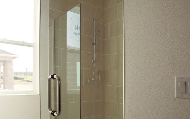 14569 Crestavista Dr, Clermont, FL 34714 - bathroom with a stall shower and a textured wall