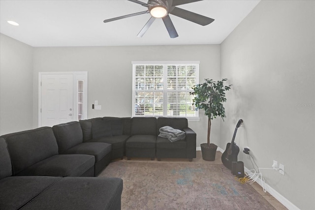 living room with ceiling fan