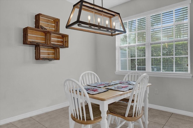 tiled dining area featuring a wealth of natural light