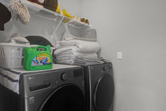 laundry room with separate washer and dryer