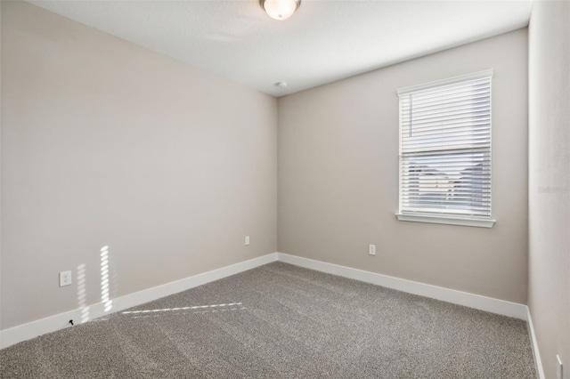 unfurnished room with carpet