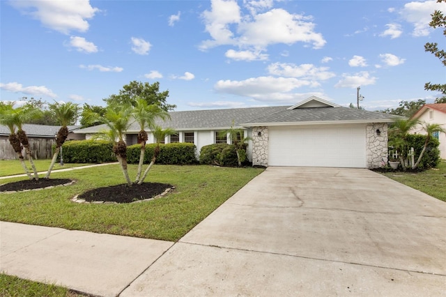 single story home with a garage and a front yard