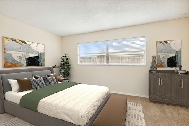 bedroom featuring light carpet and a textured ceiling