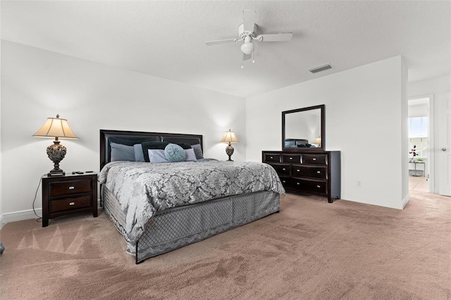 bedroom featuring ceiling fan and carpet floors