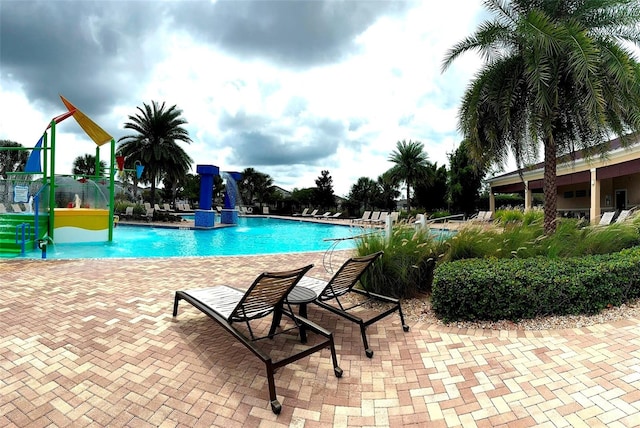 view of pool featuring pool water feature