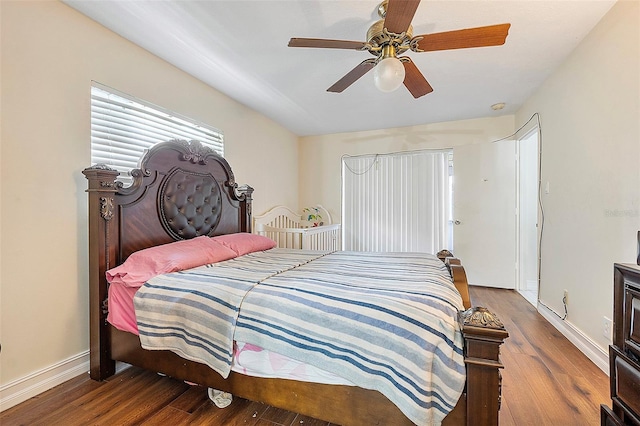 bedroom featuring ceiling fan and hardwood / wood-style flooring