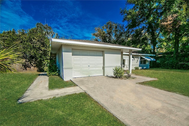 garage with a yard