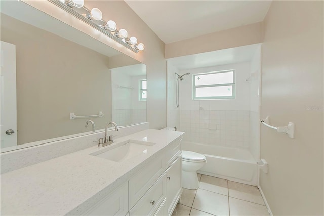 bathroom featuring tile patterned floors, vanity, and toilet