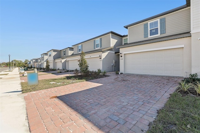 front of property featuring a garage