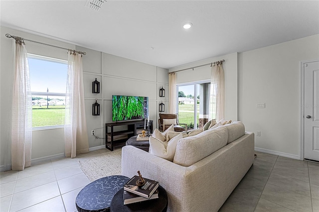 living room featuring light tile patterned flooring