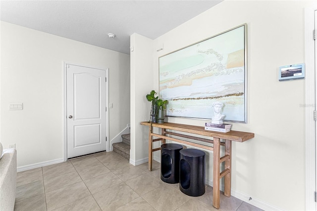 interior space with light tile patterned floors