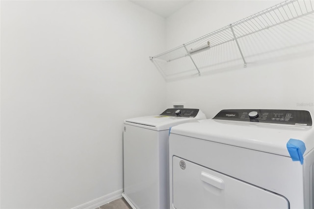 laundry area with washing machine and dryer