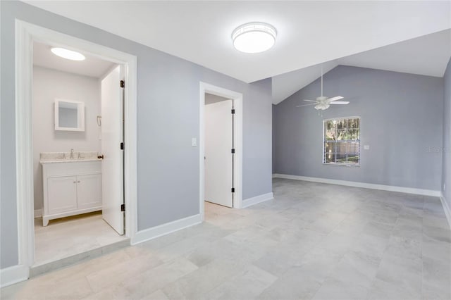 5625 Chipola Cir, Orlando, FL 32839 - unfurnished room featuring a sink, ceiling fan, baseboards, and vaulted ceiling