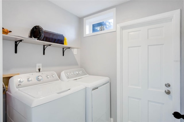 5625 Chipola Cir, Orlando, FL 32839 - clothes washing area featuring washing machine and dryer