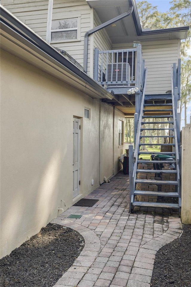 5625 Chipola Cir, Orlando, FL 32839 - view of patio / terrace featuring stairway and a deck