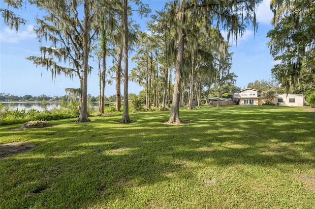 5625 Chipola Cir, Orlando, FL 32839 - view of green lawn with a water view
