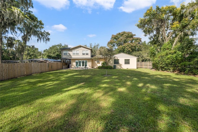 5625 Chipola Cir, Orlando, FL 32839 - rear view of house featuring stucco siding
