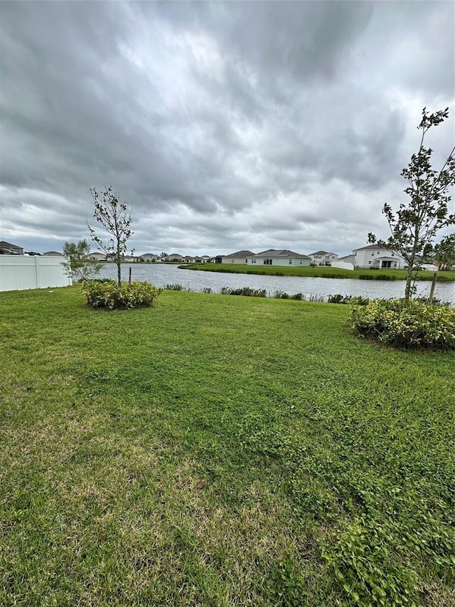 view of yard with a water view