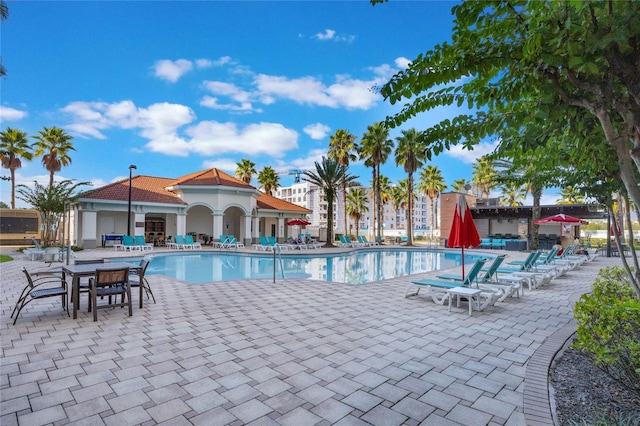 view of swimming pool with a patio area