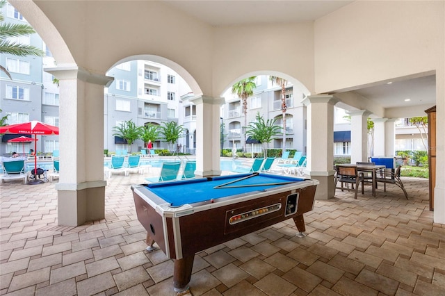 recreation room with pool table and ornate columns