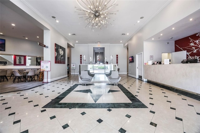 reception area featuring an inviting chandelier