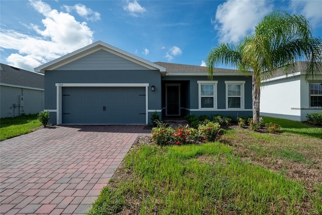 ranch-style home with a garage