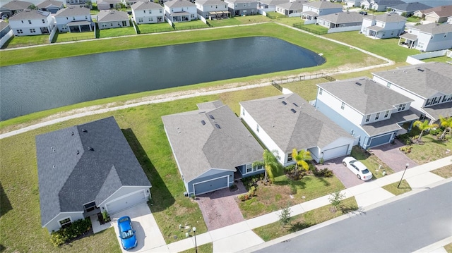 drone / aerial view with a water view